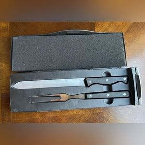 Pampered Chef Meat carving set

Forged high carbon steel

With case